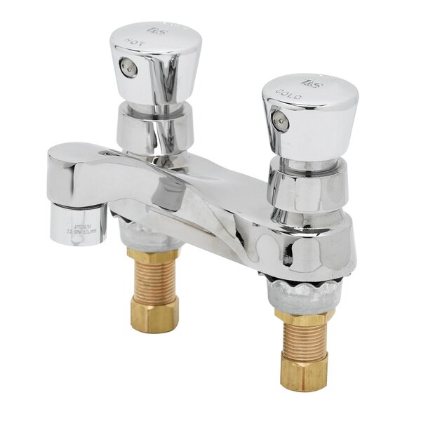 A T&S deck mount metering faucet with push button caps.