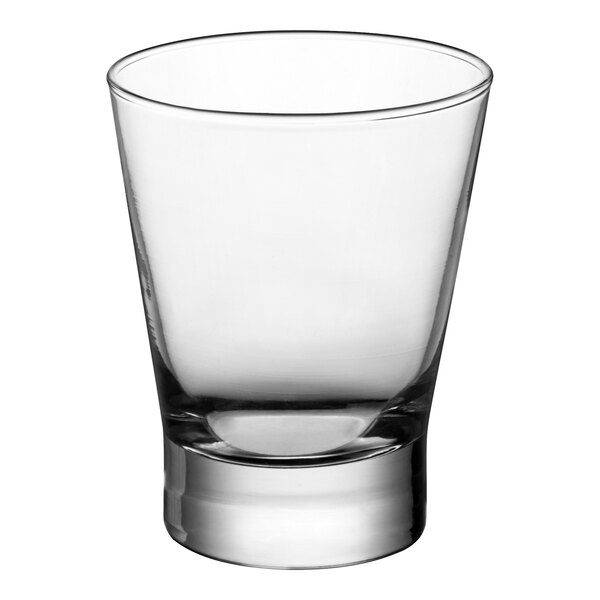 A clear, short, wide glass tumbler designed for serving rocks or old fashioned cocktails.