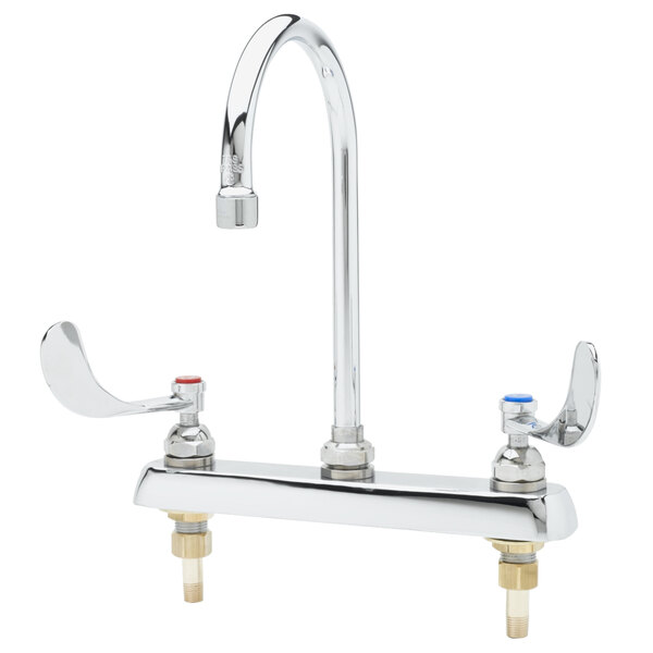 A chrome T&S deck mount faucet with 4" wrist action handles.