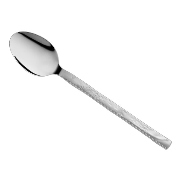 A stainless steel dessert spoon with a textured handle.