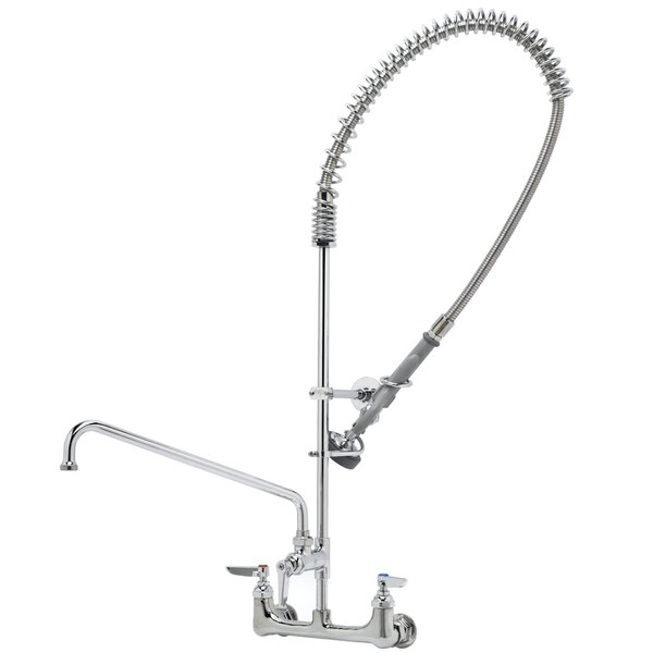 A silver T&S wall mounted pre-rinse faucet with curved hose.