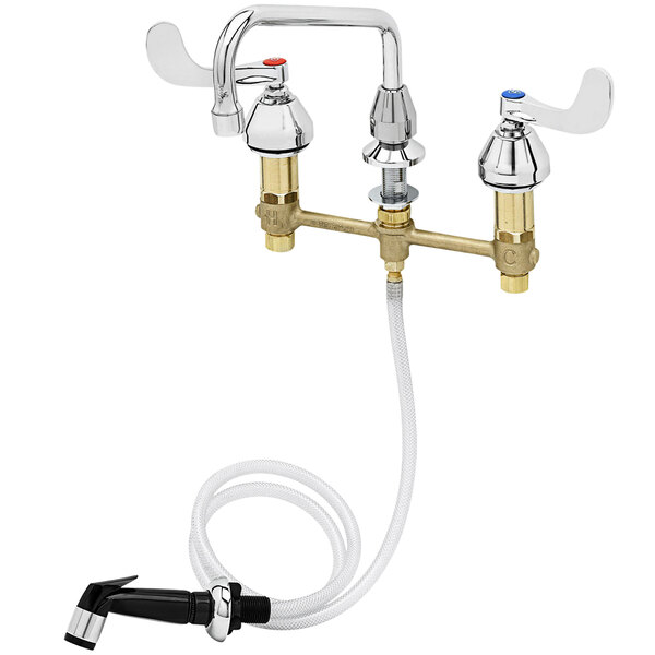 A white T&S deck mount faucet with swing nozzle and sidespray hose.