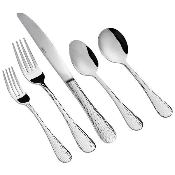 A five-piece set of stainless steel flatware with textured handles, including two forks, a knife, and two spoons.