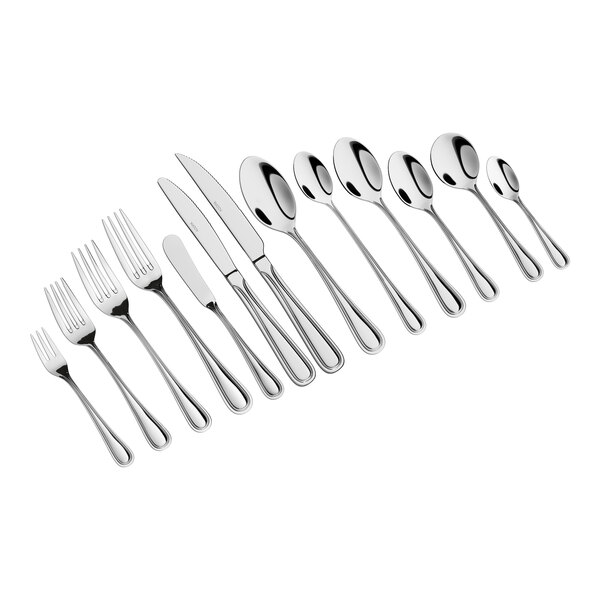 A set of stainless steel flatware including forks, knives, and spoons arranged in a row.