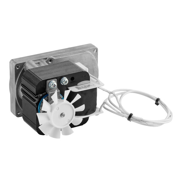 A small electric motor with a white plastic fan blade, mounted on a metal plate, and attached to a white cable with connectors.
