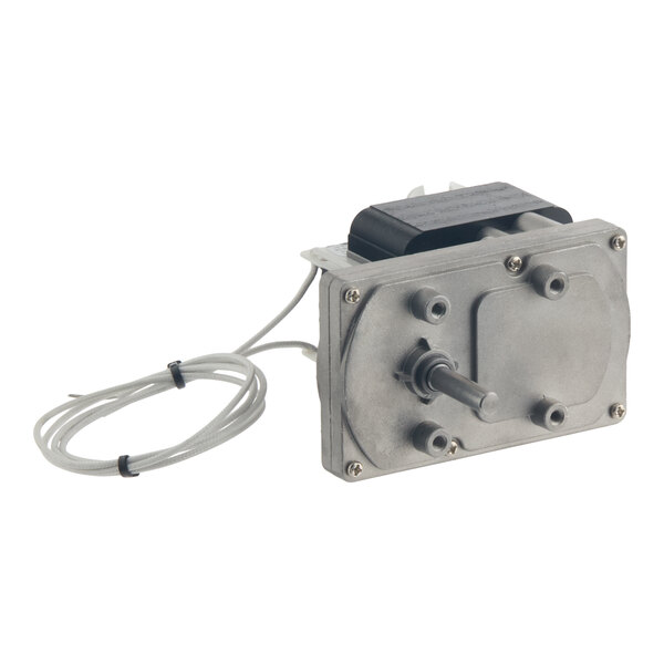 A rectangular metal motor with a protruding shaft, attached wiring, and a black component on top.