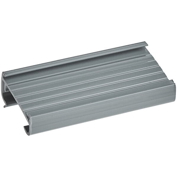 A gray label holder designed for wire shelving.