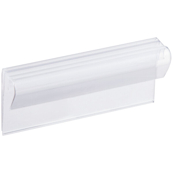 A clear plastic clip-on label holder for shelving, measuring 3 inches by 1 1/4 inches.