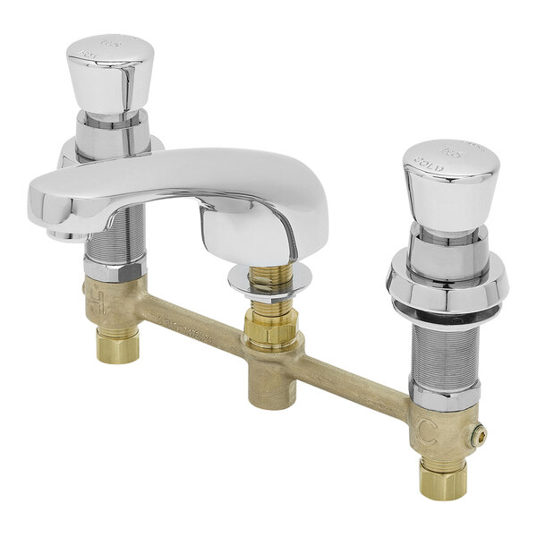 A T&S chrome metering faucet with two brass valves and push button caps.