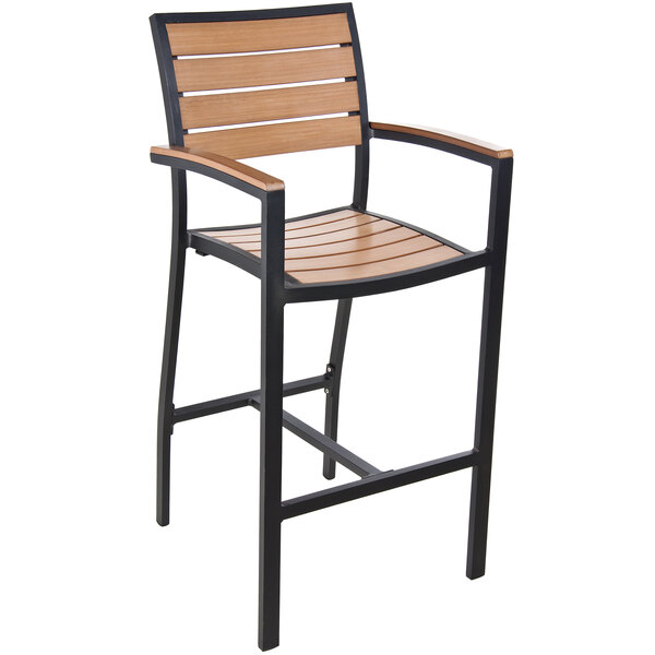 A BFM Seating black synthetic teak bar chair with black legs.