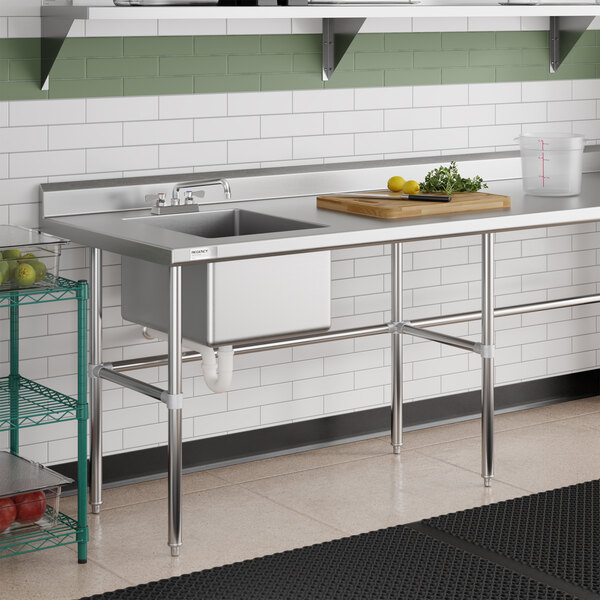 A stainless steel work table with a left-side sink and cross bracing, designed for commercial kitchen use.