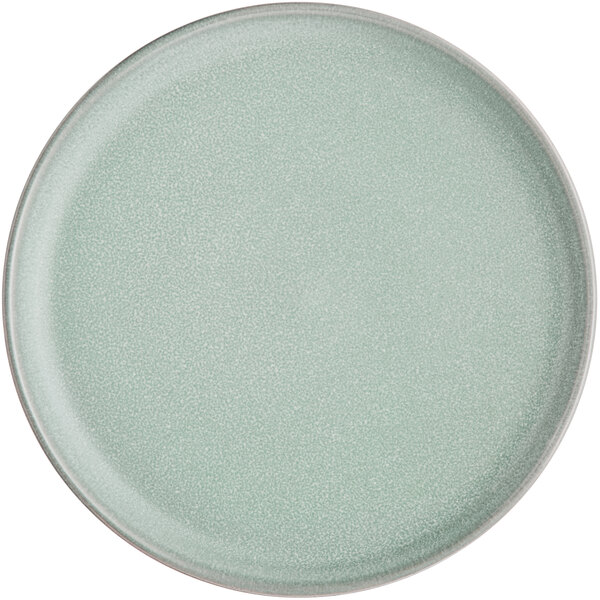 A round, matte, light blue plate with a slightly raised rim.