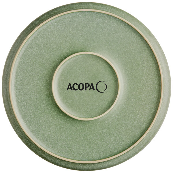 A round, sage green plate with a matte finish and the word 'ACOPA' printed in black on the bottom center.