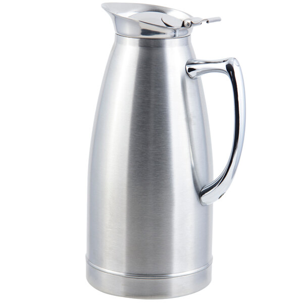 A silver metal Bon Chef insulated stainless steel coffee server with a handle.
