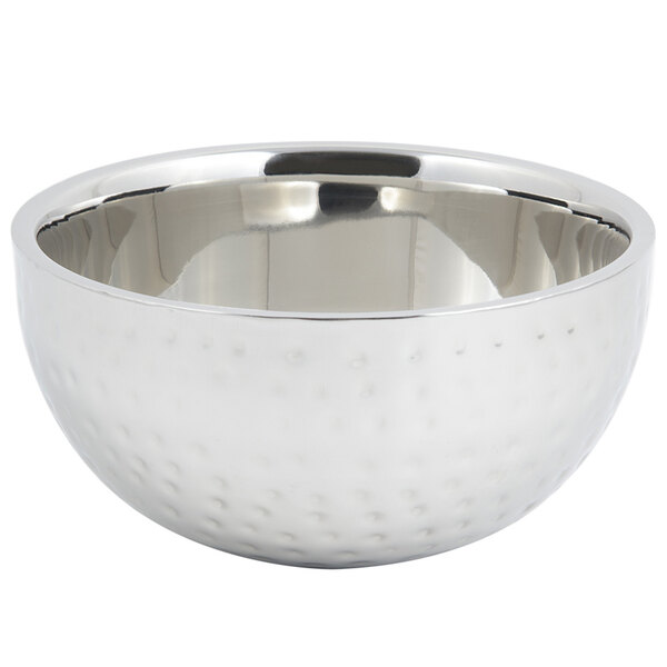 A silver stainless steel Bon Chef double wall bowl with a hammered finish.