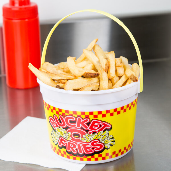 A 48 oz. plastic French fry bucket with a handle filled with French fries.