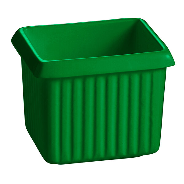 A green cast aluminum rectangle server with ridges and a lid.