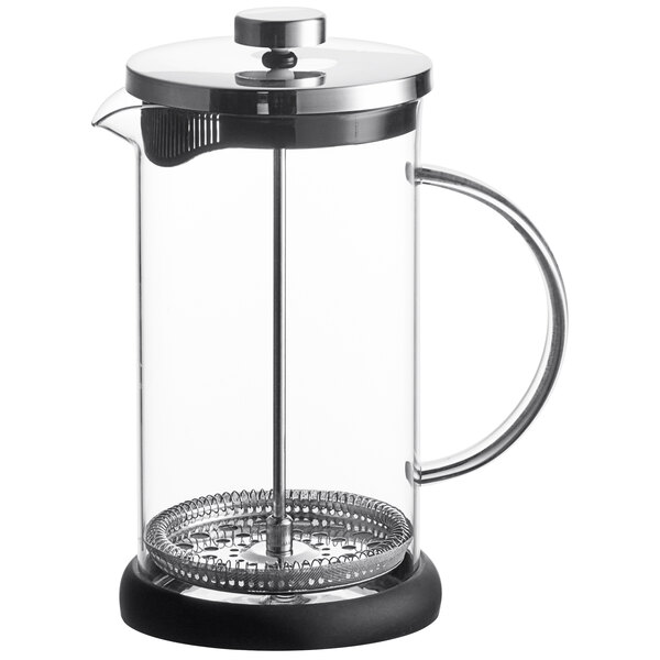 A clear glass French press with a metal lid, plunger, and handle, featuring a black base.