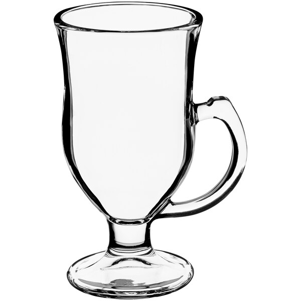 An 8 oz. clear glass Irish coffee mug with a handle and a pedestal base.