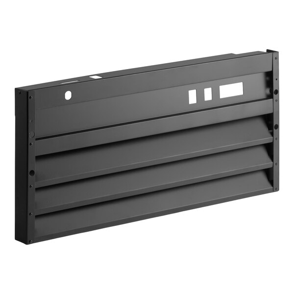 A black rectangular metal grille with horizontal slats and several cut-out sections, viewed at an angle.