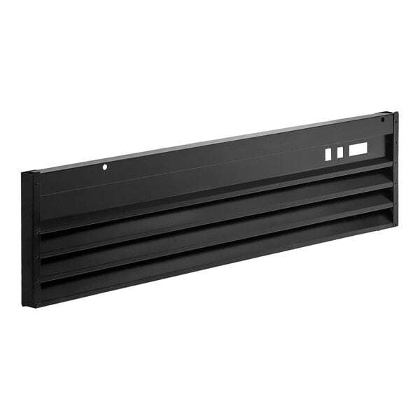 A black metal grille with horizontal slats and a few rectangular cutouts on one side.