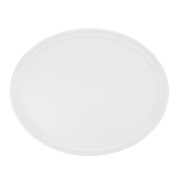 A white oval Cambro tray with a white rim.