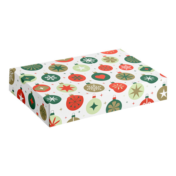 A rectangular box decorated with a festive ornament pattern in red, green, and gold colors.