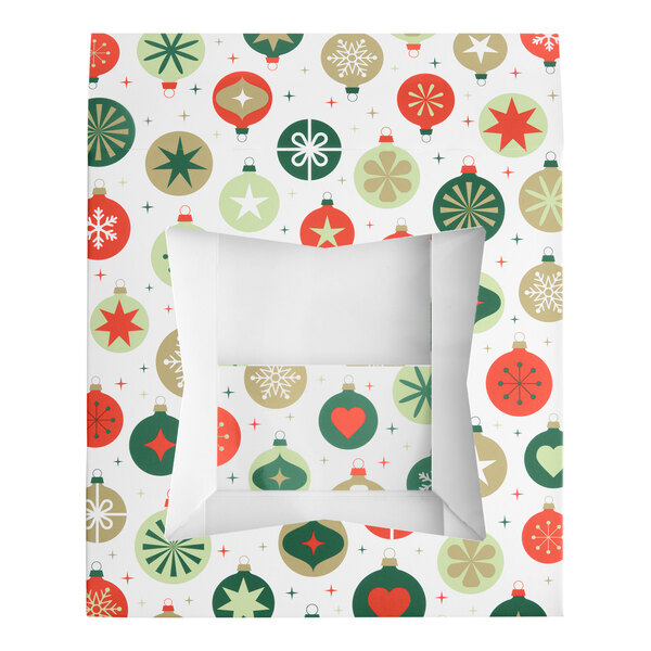 A square bakery box with a clear window on top, decorated with a festive pattern of red, green, and gold Christmas ornaments.