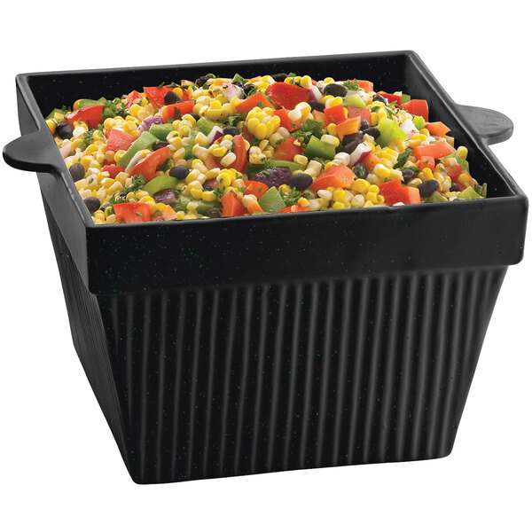 A Tablecraft black cast aluminum square bowl with mixed vegetables in it on a table in a salad bar.