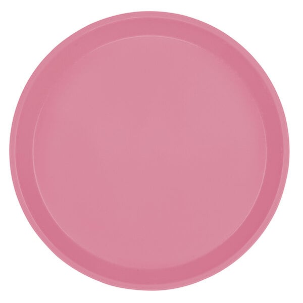 A close-up of a pink Cambro fiberglass tray.