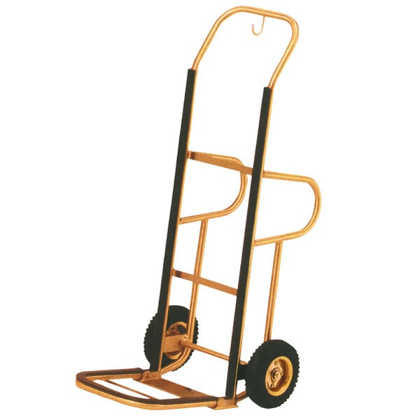 A stainless steel Aarco luggage cart hand truck with black wheels and a brass finish handle.