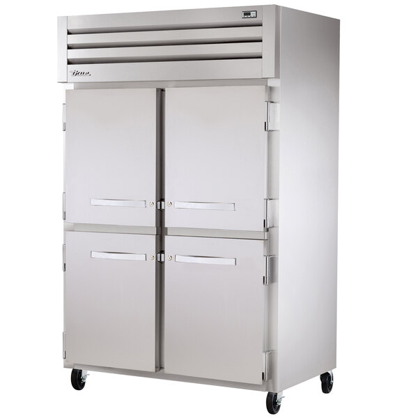 A True stainless steel 2 section heated holding cabinet with 4 half doors.