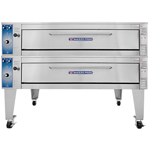 A large silver Bakers Pride double deck electric pizza oven on a counter.