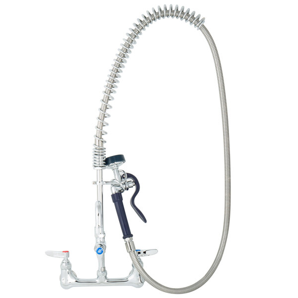 A silver T&S pet grooming faucet with a metal hose and nozzle attached.