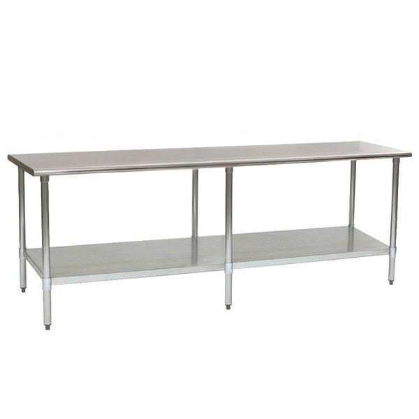 A long stainless steel Eagle Group work table with a galvanized shelf underneath.