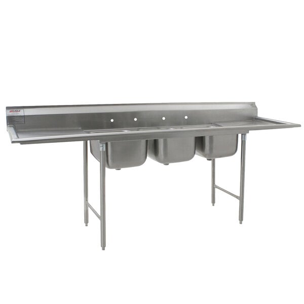 A stainless steel Eagle Group three compartment commercial sink with drainboards.