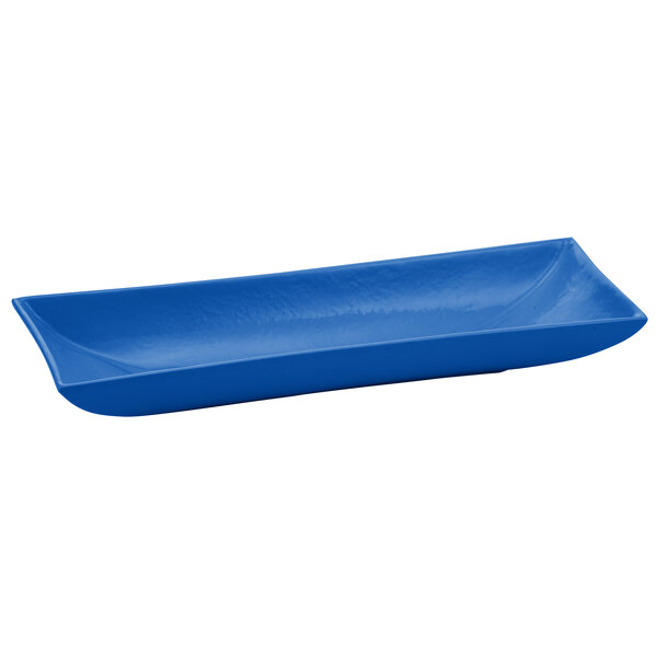 A cobalt blue cast aluminum rectangular platter with flared ends.