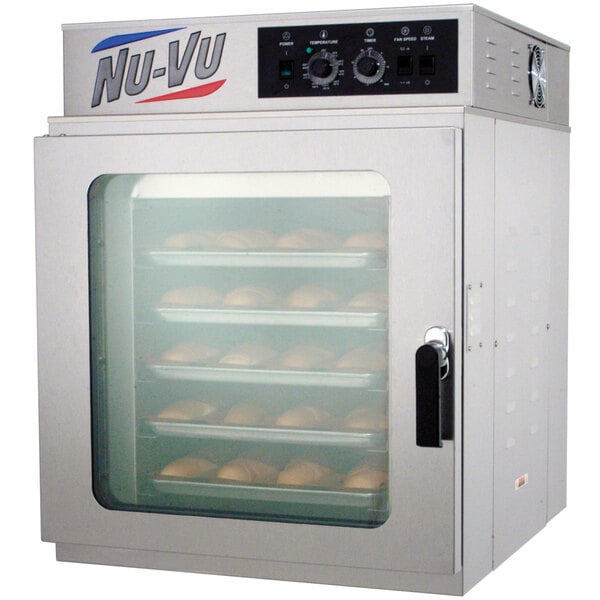 A NU-VU countertop convection oven with trays of bread inside.