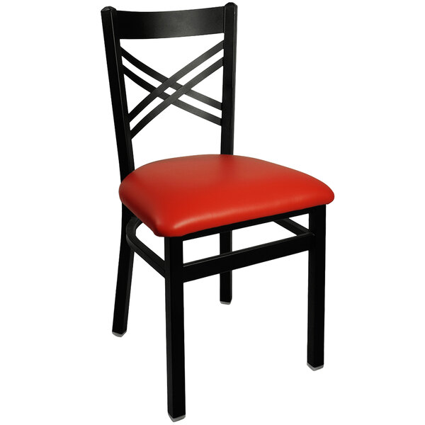 A black metal BFM Seating restaurant chair with a red vinyl seat.