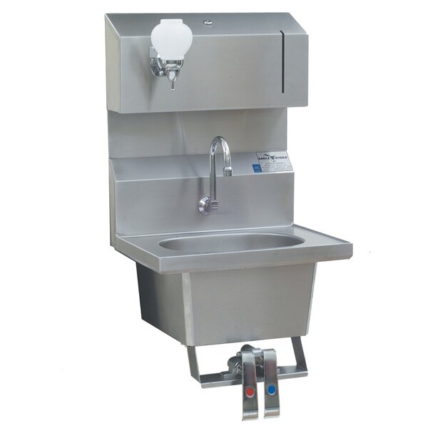 A stainless steel Eagle Group knee operated hand sink with faucet.