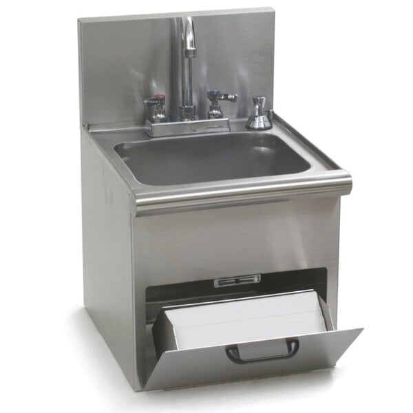 A stainless steel Eagle Group hand wash sink with a gooseneck faucet, towel dispenser, and soap dispenser.