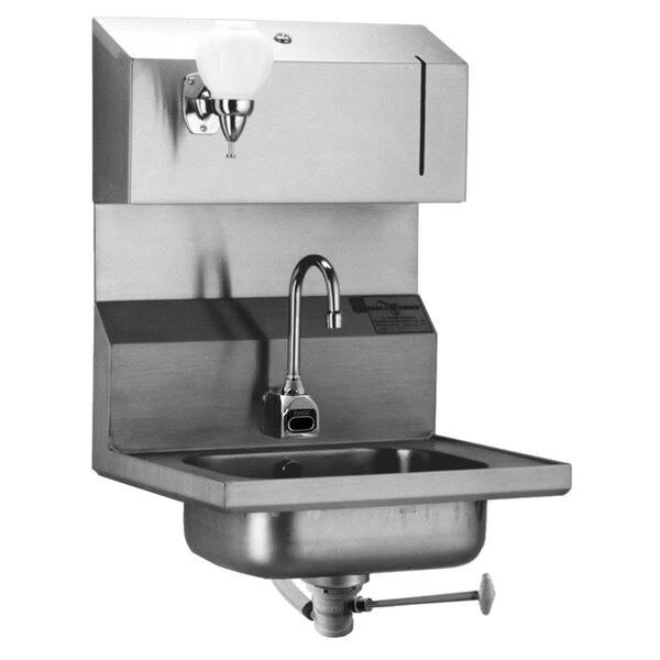 An Eagle Group stainless steel hand sink with a gooseneck faucet, soap dispenser, and towel dispenser.