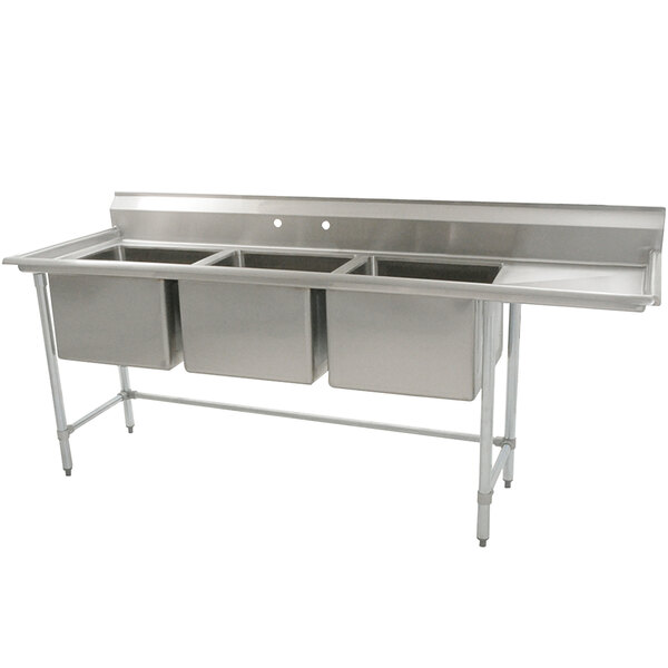 A stainless steel Eagle Group three compartment sink with a right side 24" drainboard.