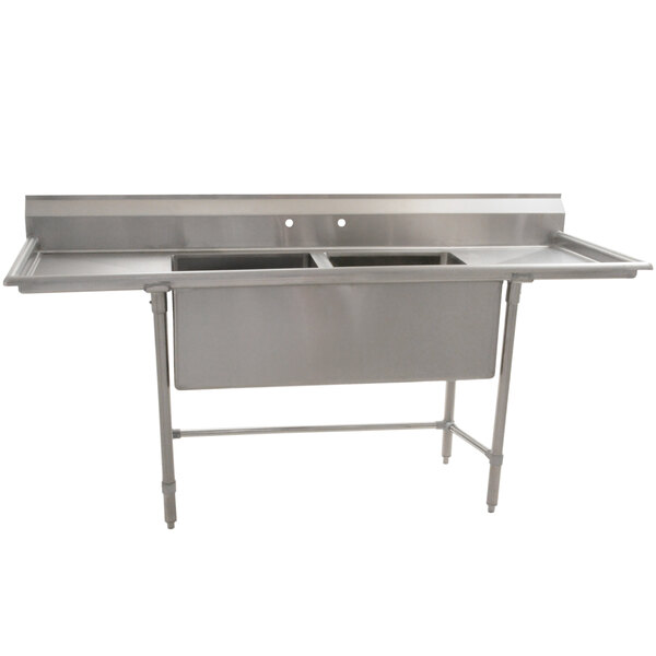 A stainless steel Eagle Group two compartment sink with two 18" drainboards.