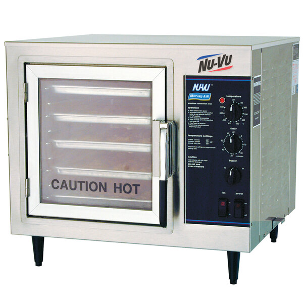 A NU-VU countertop convection oven with a caution hot sign.