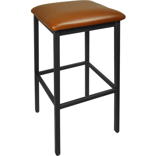 A BFM Seating Trent black steel barstool with a light brown vinyl seat.