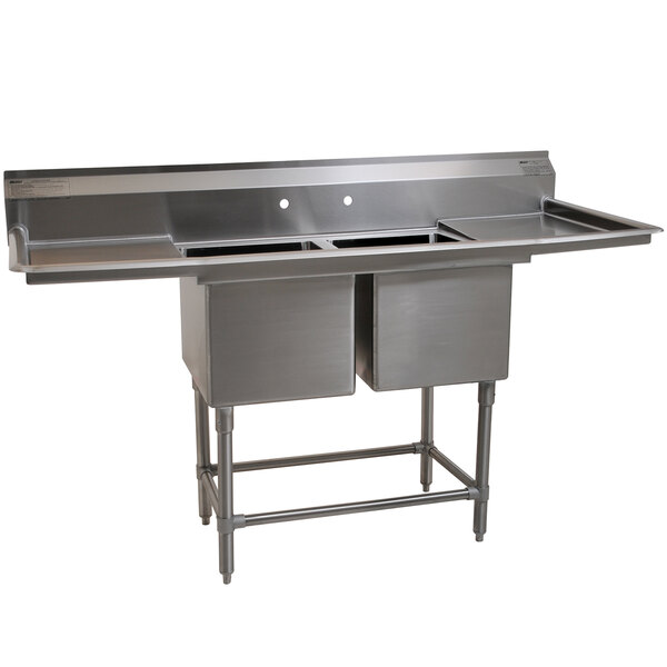 A stainless steel Eagle Group 2 compartment sink with two 18" drainboards.