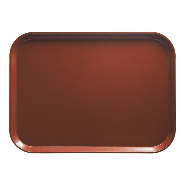 A rectangular red Cambro cafeteria tray with a real rust border.