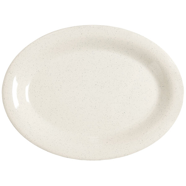 A white oval platter with speckled specks.