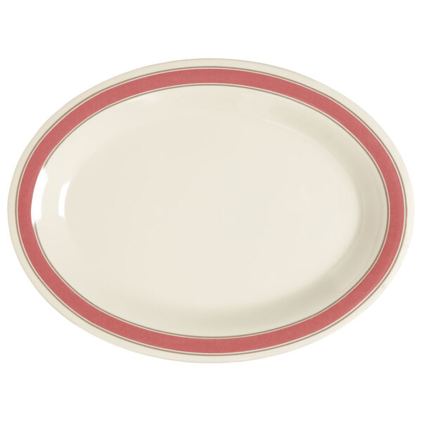 A white oval platter with a red rim.